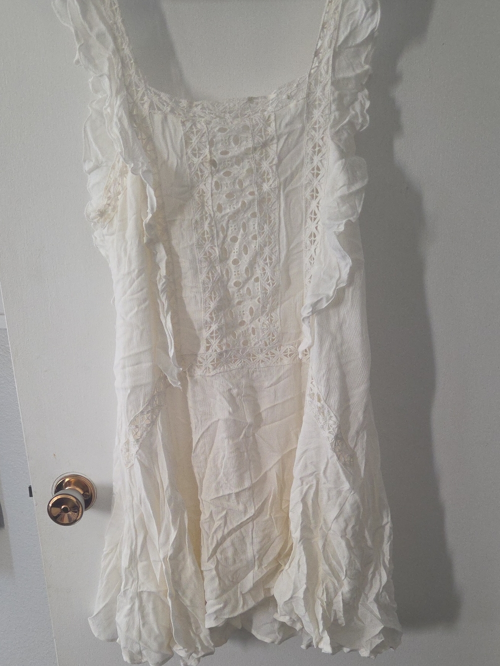 Sleeveless Crocheted Ruffle Mini Dress in Cream